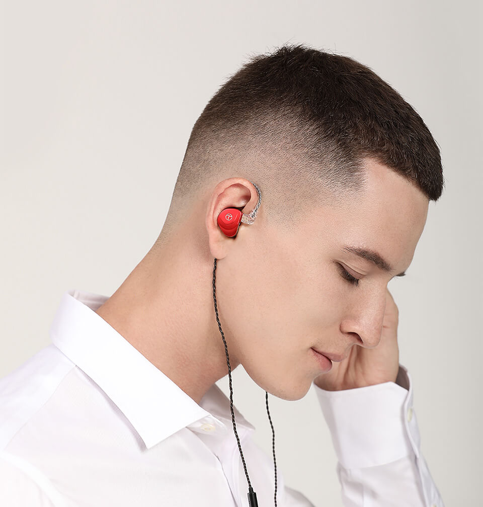 Crimson red TRN V90S earphone in man's ear