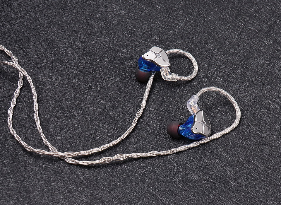 TRN T2 cable connected to blue TRN STM earphone